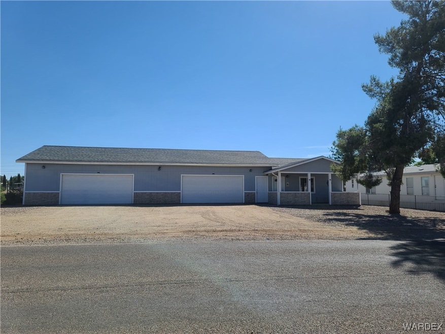 Ranch-style home with incredible garages....  rock