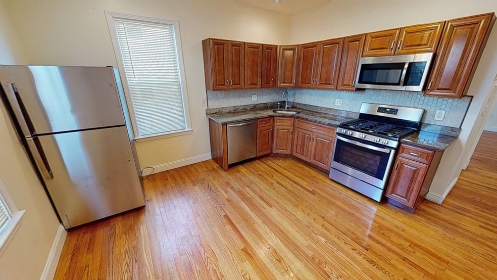 53 Hazleton St unit 1, Boston, MA 02126 - photo 1