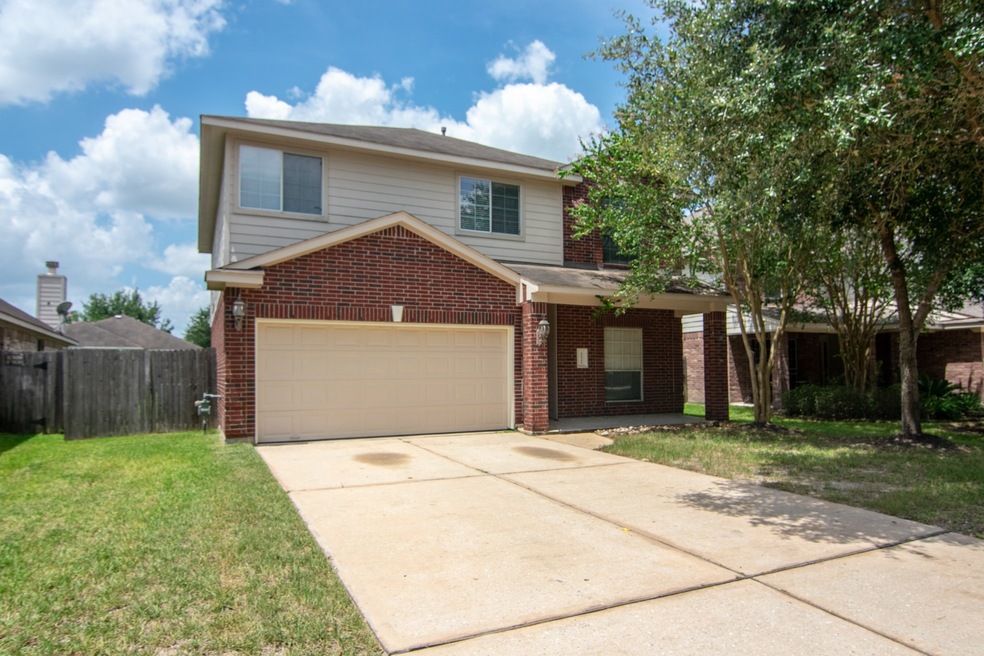 31711 Regal Park Ct, Conroe, TX 77385 - photo 1