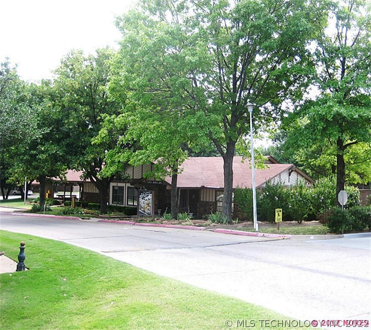 View of Clubhouse & Covered Area + two Pools