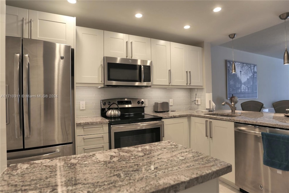 470 Paradise Isle Blvd unit 107, Hallandale Beach, FL 33009 - photo 1