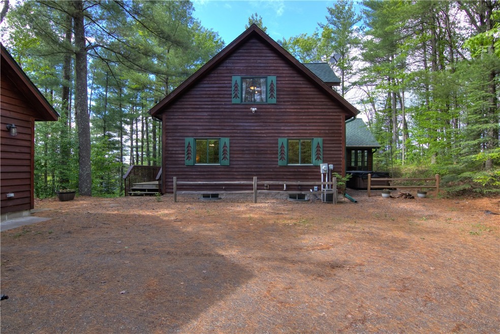 View from driveway-garage to left side
