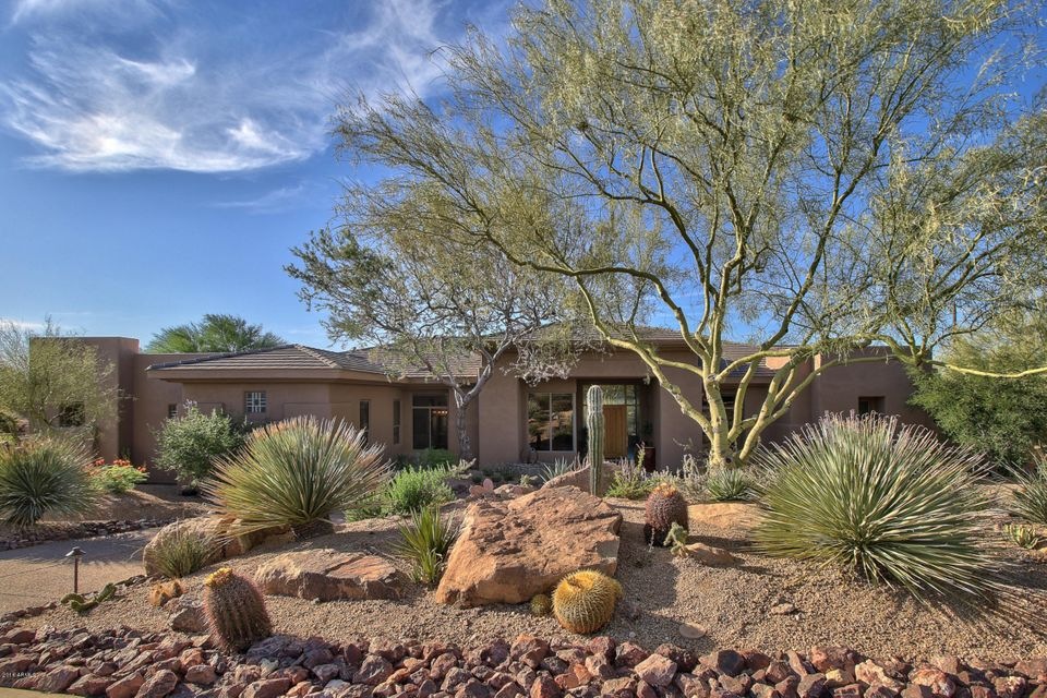 Front elevation with desert plants
