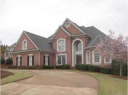 Exterior Front. Lovely four sides brick with circu
