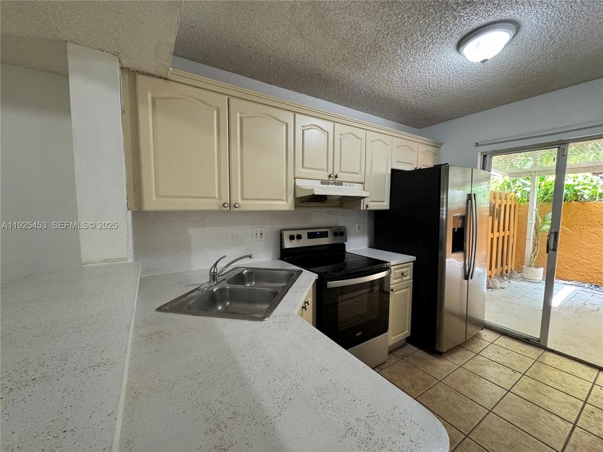 7497 W 22nd Ave unit 104, Hialeah, FL 33016 - photo 1