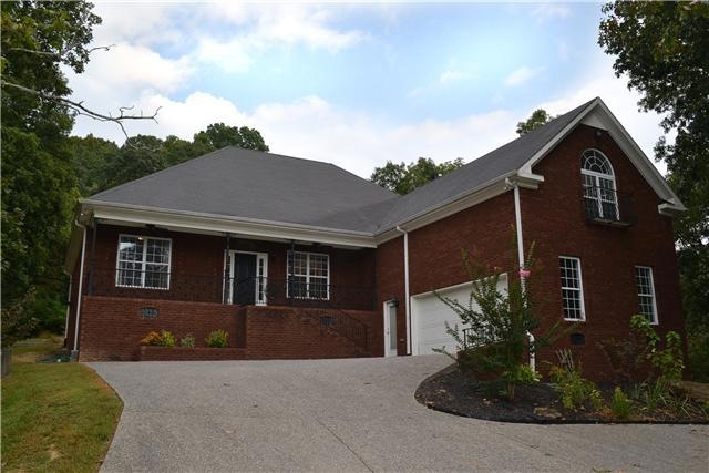 The custom built home all brick home boasts a number of beautiful ornamental iron details that include railings, columns, window accents, and vent covers reminiscent of the craftsmanship used to build historic Charleston homes.