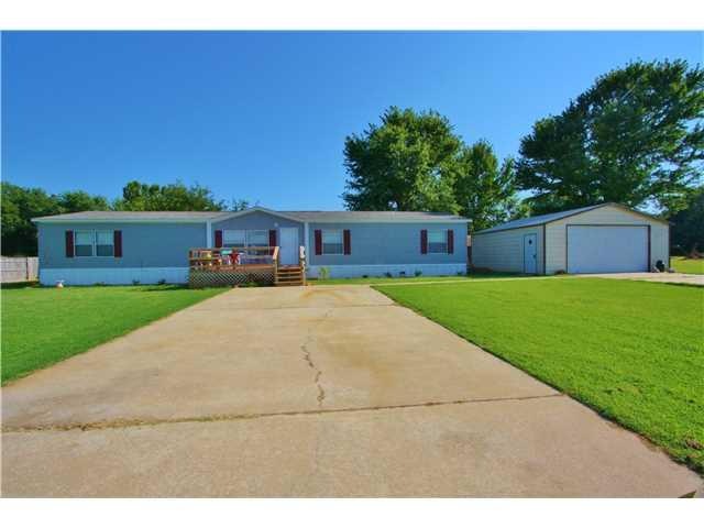 Exterior Front. On an Acre Lot with 2 driveways an
