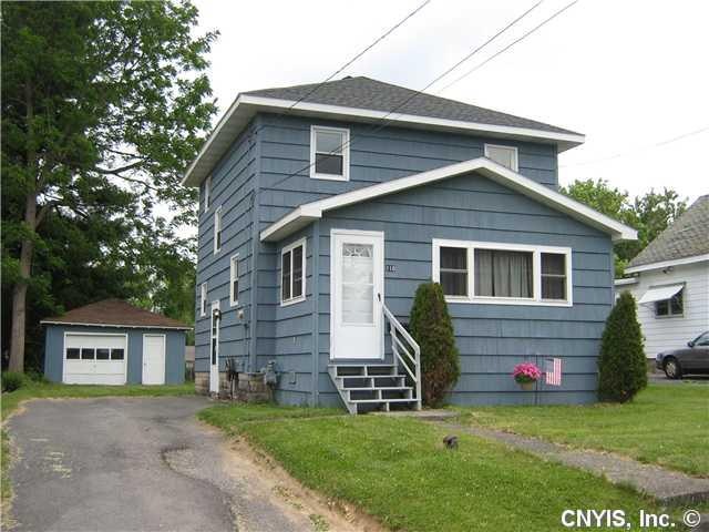 Exterior Front. Newer exterior paint and roof.