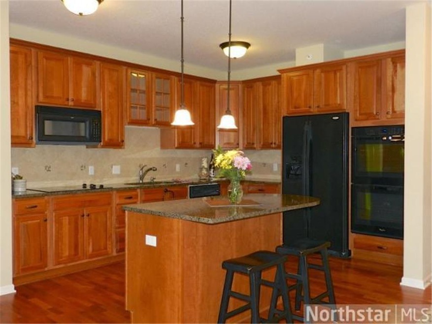 Stunning gourmet kitchen features granite counters