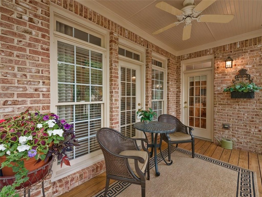 Love this screened porch! Beautiful brick color to
