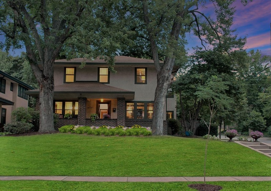 Stately and charming, this Lynnhurst gem is steps 