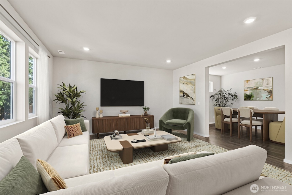 Great room to enjoy relaxing. Photo is representational. Actual home is under construction. Colors, materials, and features may vary. See site agent for details.