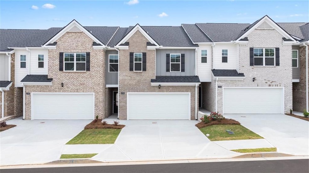 View of property with a garage