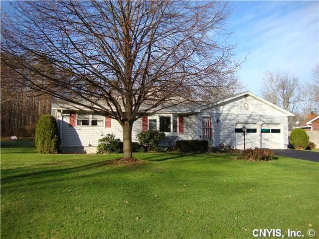 Exterior Front Ranch with river ROW across street,
