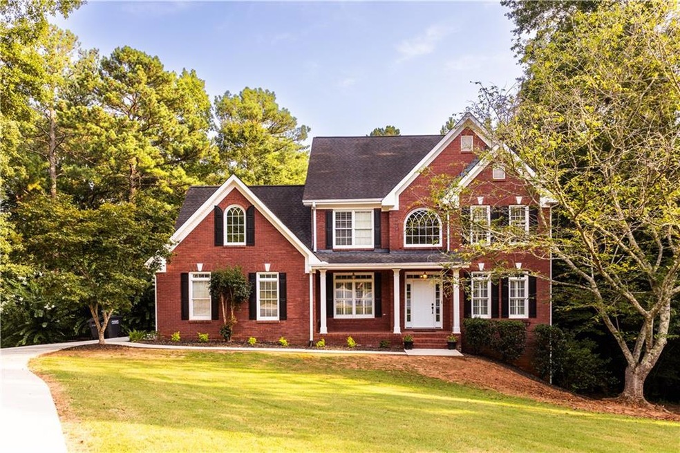 home featuring a front lawn