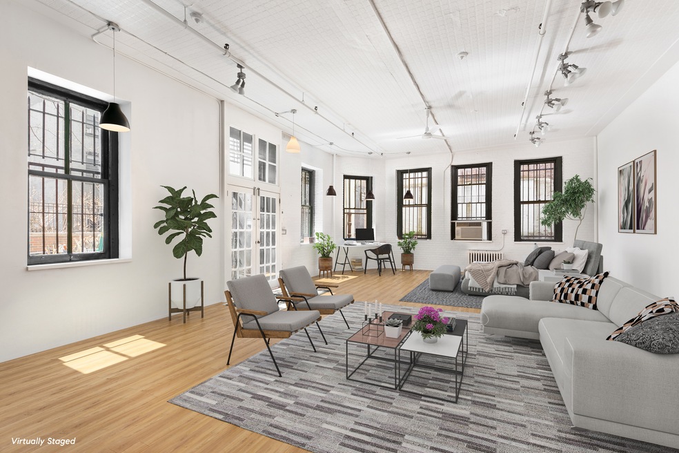 140 Sullivan St unit 1-FLR, New York, NY 10012 - photo 1