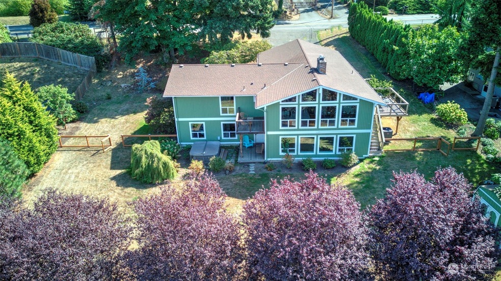 Location, Location! Valley Views from this 4bed/3bath home with large park-like yard! Enter this open floor plan home to brazilian cherry hardwood floors leading to living & dining rooms with vaulted ceilings, floor to ceiling brick fireplace, and walls of windows to view those beautiful sunsets and territorial views. Remodeled kitchen with stainless steel appliances, cherry cabinets, newer gas range, cabinet pull-outs, and breakfast bar. Primary suite with spa-like bath featuring heated marble flooring, granite vanity with raised vessel sink, and a large closet with organizer. Extra storage room with workbench, newer a/c, gas furnace, and hot water heater plus hard wired generator stays with home. 2-car carport plus driveway parking.