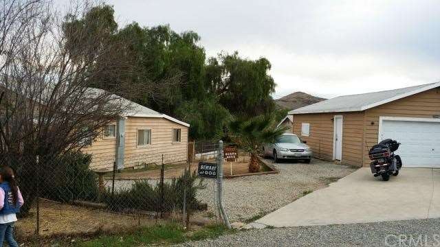 FRONT DRIVEWAY TO HOUSE AND GARAGE