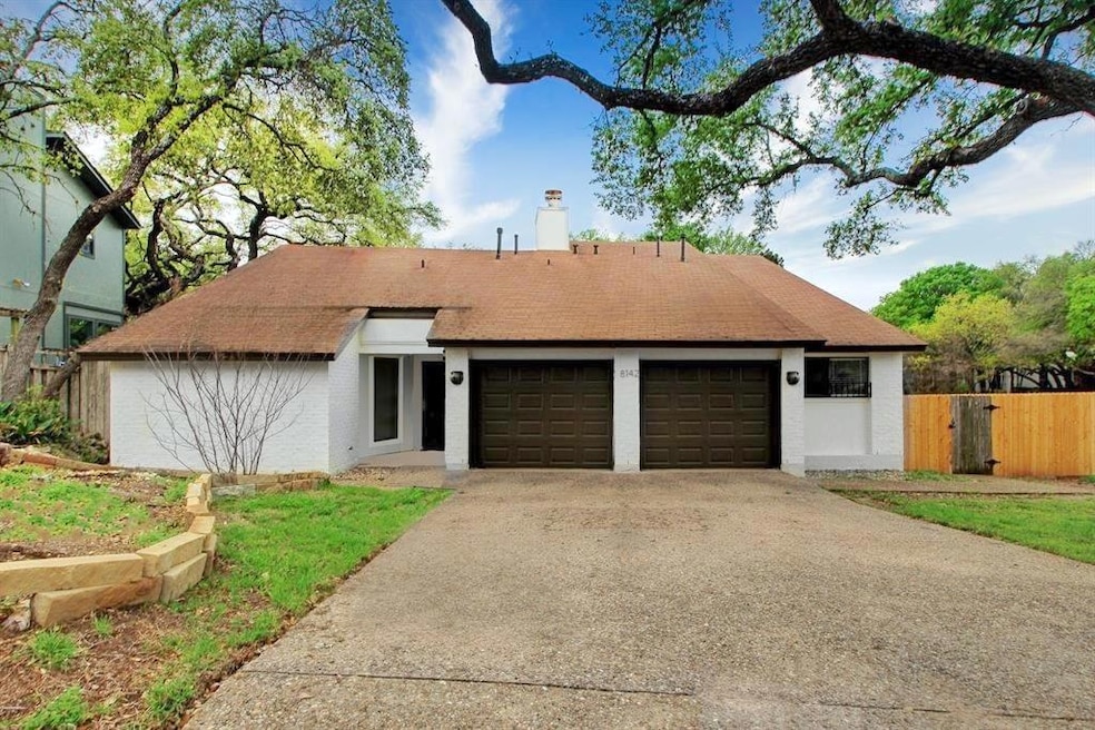 Ranch-style home featuring fence, a chimney, driv