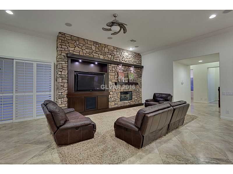 Family Room features Custom Builtins and Fireplace