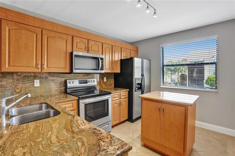 5781 Riverside Dr unit 201A4, Coral Springs, FL 33067 - photo 1