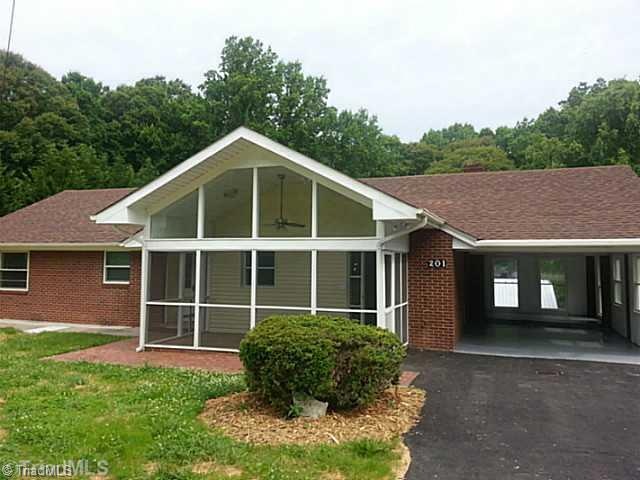 Exterior Front. Relaxing screened porch.