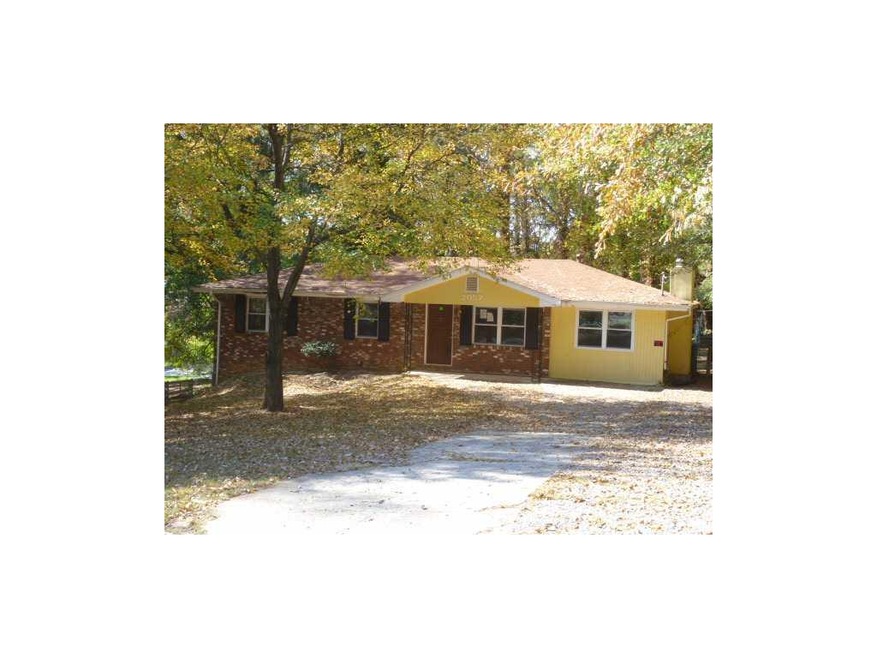 Exterior Front. Four Sided Brick Ranch on a partia