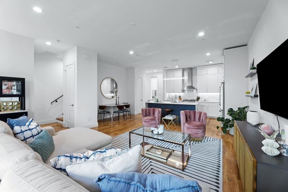 Living room featuring light hardwood / wood-style 