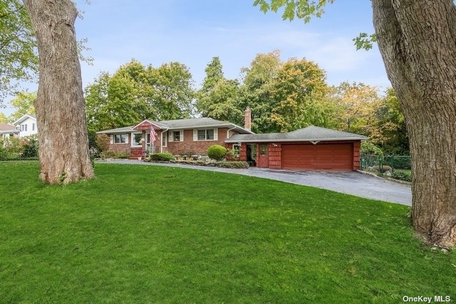 Front view with circular driveway