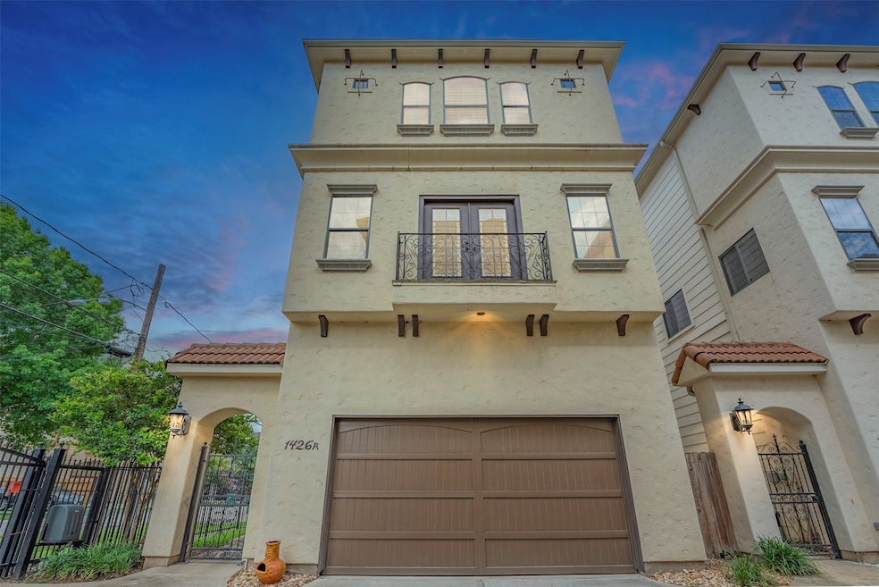 Bold and beautiful on a corner lot—Mediterranean style with zero HOA in a sought-after Heights location.