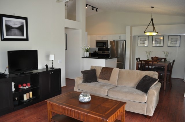 Bright, open living area with separate dining and