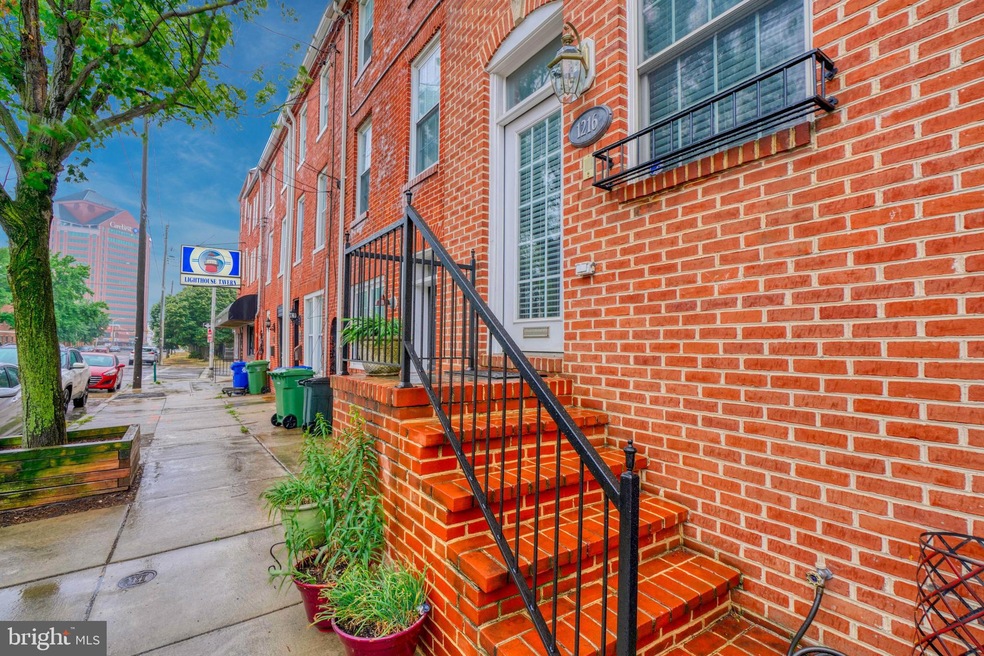 1216 S Clinton St, Baltimore, MD 21224 - photo 1