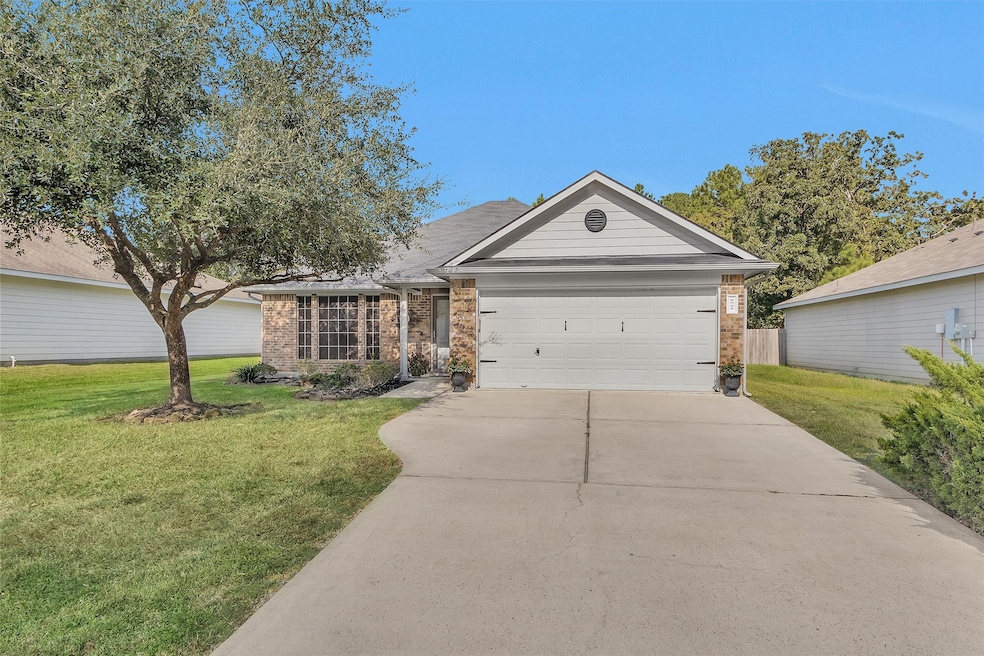 8962 W Buffalo Cir, Willis, TX 77378 - photo 1