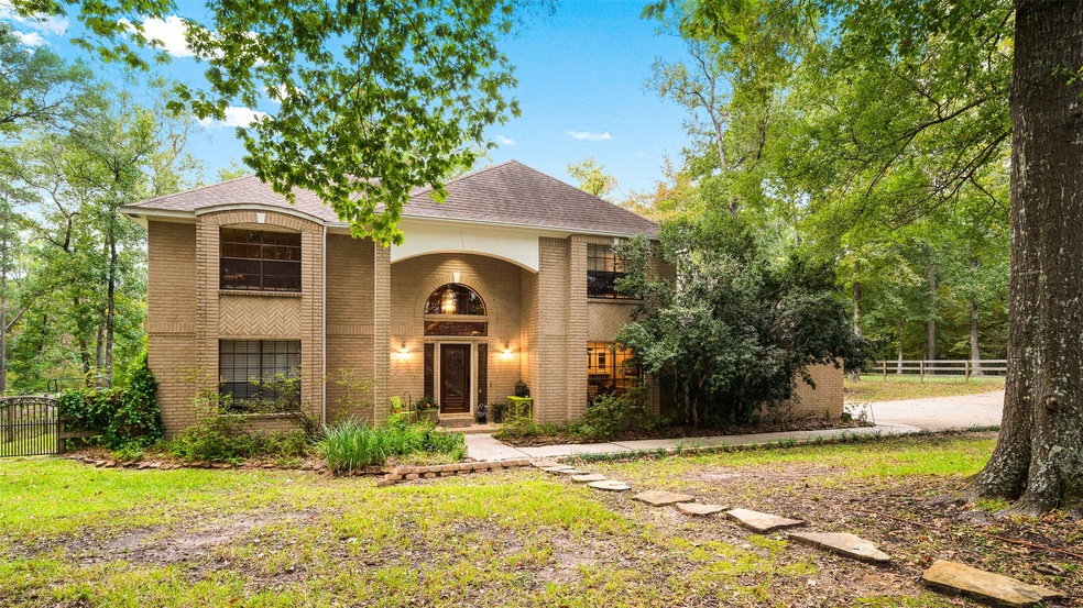 beautiful custom 2 story brick house set back on a