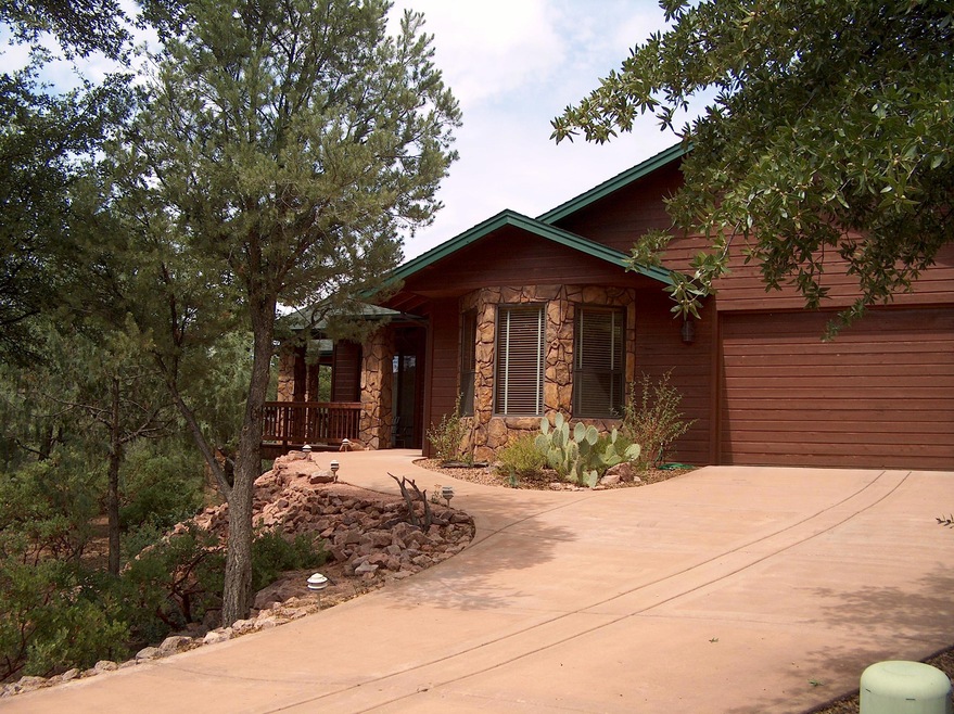 Front Elevation is Nicely Treed
