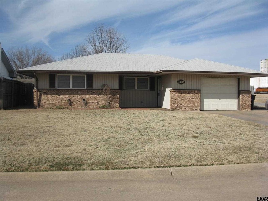 This home sits on a corner lot, wood privacy fence