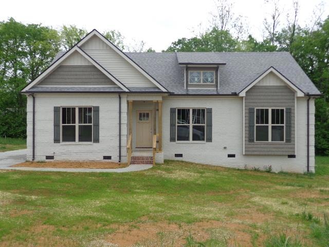 Make this new all brick your dream home!