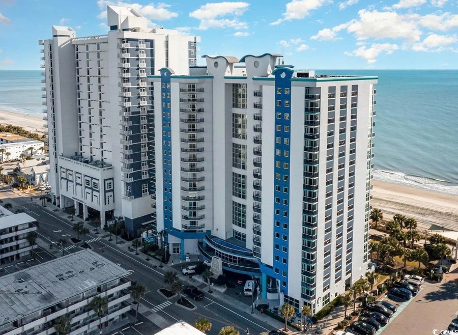 Drone / aerial view featuring a water view and a b