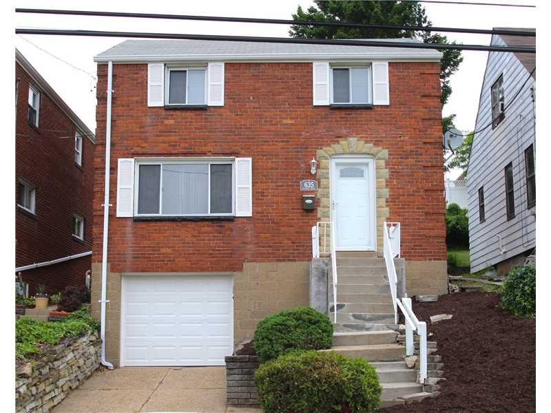 Exterior Front. Classic brick curb appeal with new