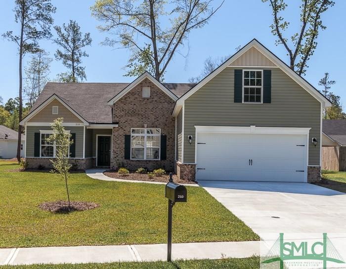 Charming ranch-style home with brick accents as we