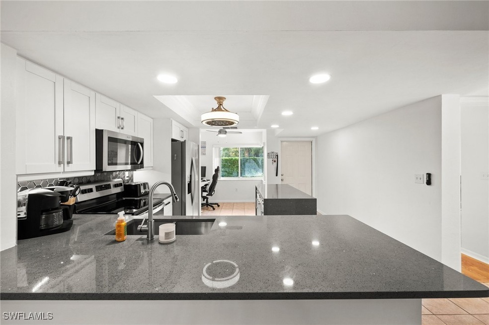 Kitchen featuring appliances with stainless steel