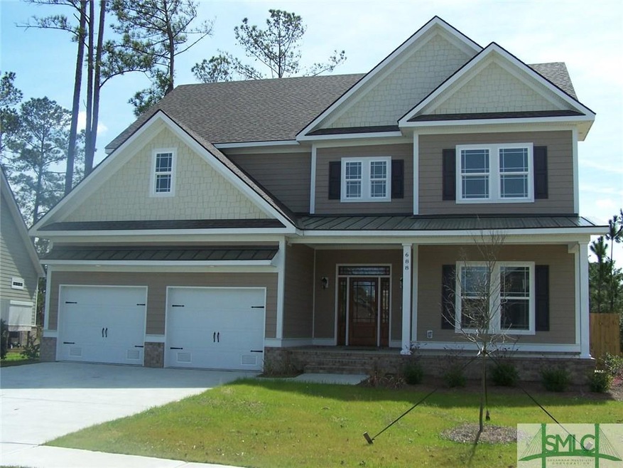 Front view of home showing large front porch.  Ext