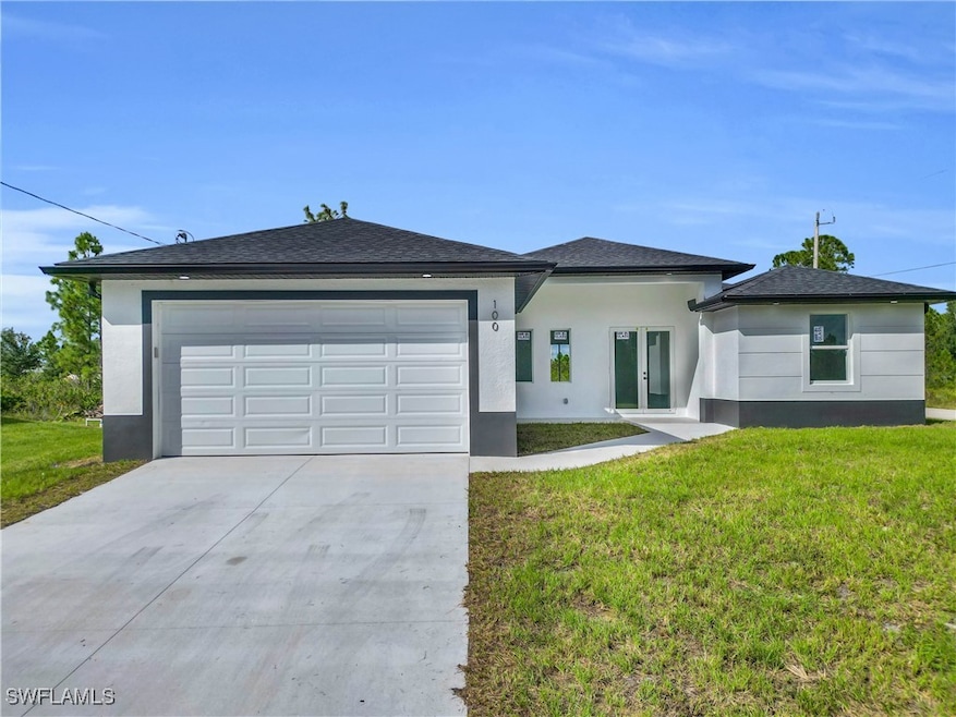 100 W 11th St, Lehigh Acres, FL 33972 - photo 1