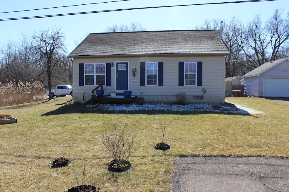 7784 Huron River Dr