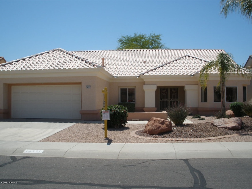 Granite ~  20x20 Tile Thru-out.