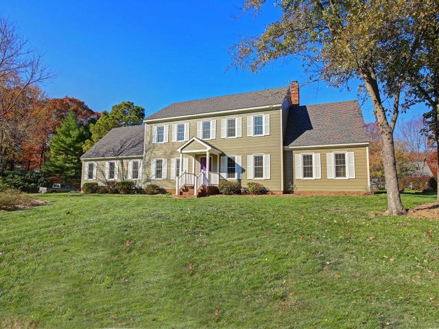 This lovely home sits on over a half acre lot.
