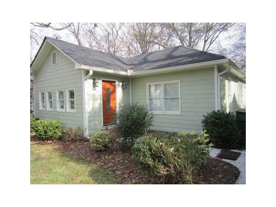 Exterior Front. This bugalow is perfect with concr