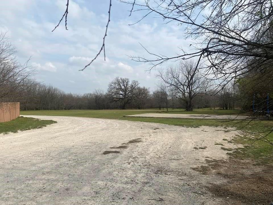 View looking south from property entrance.