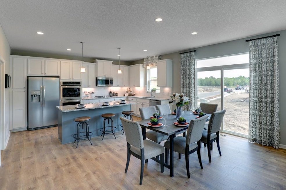 An amazing kitchen with maple white cabinets, gas 