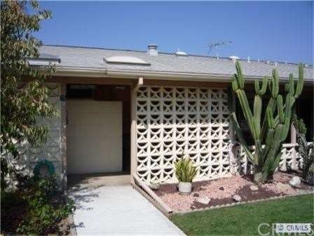 View  entrance and garden with drought resistant p